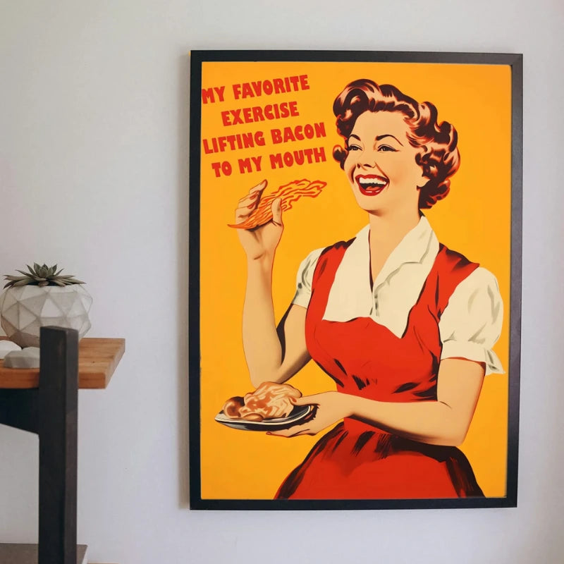 Framed poster of a woman eating bacon with humorous text on an orange background.