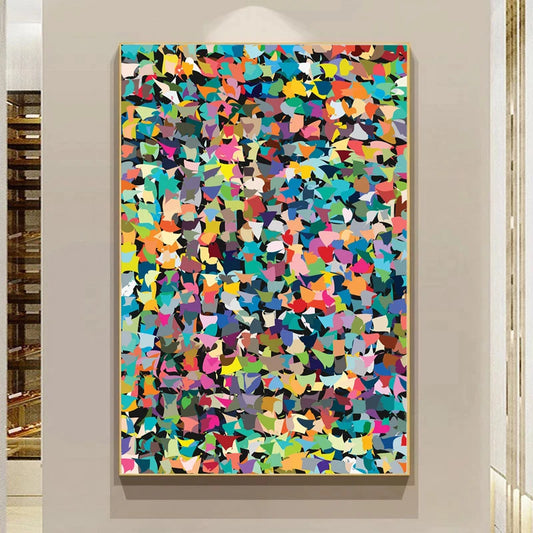 Colorful abstract art piece on a wall in a room with shelves. Canvas & Curio