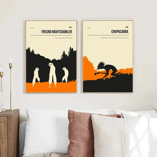 Two framed posters on a wall above a bed with pillows. Canvas & Curio