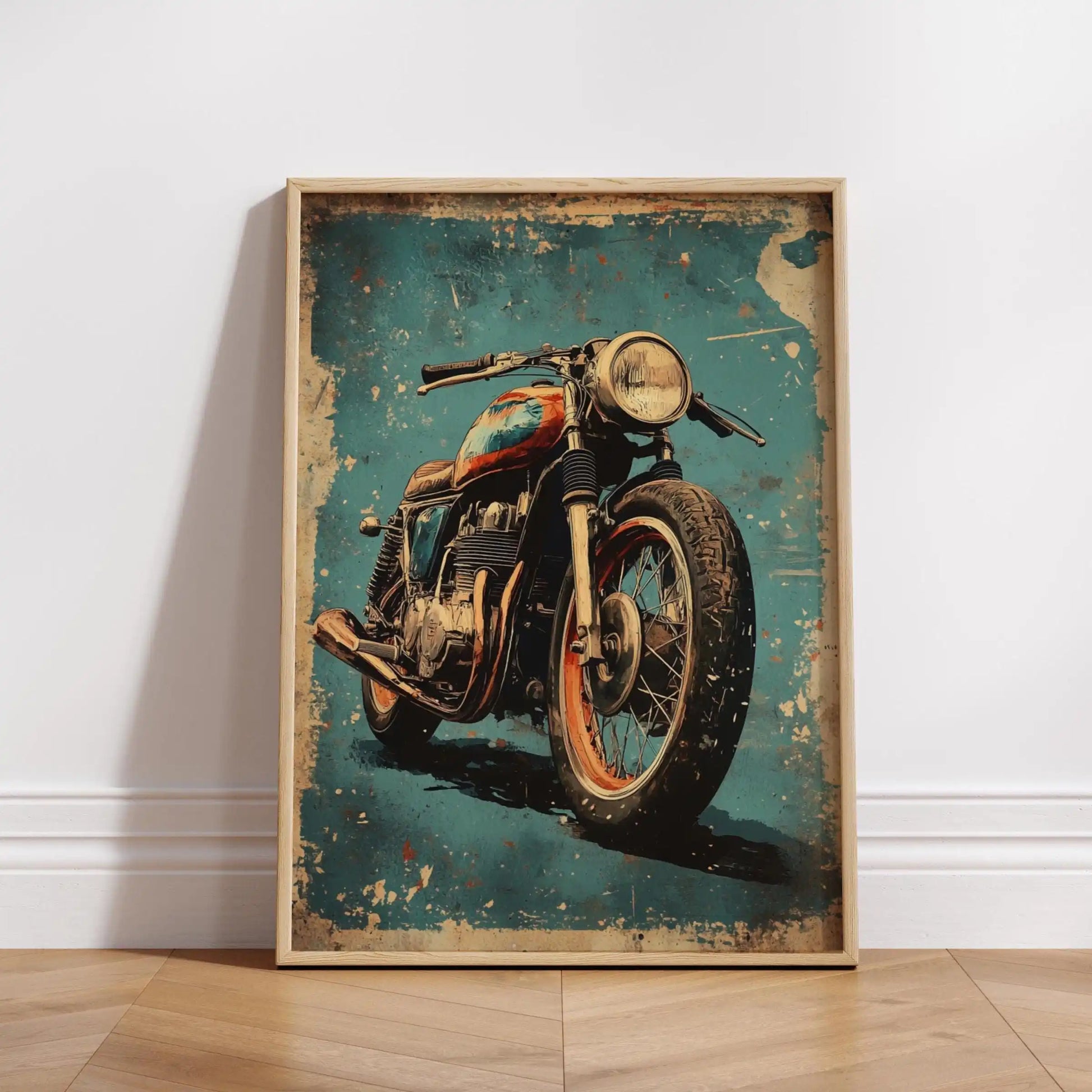 Framed poster of a vintage motorcycle on a white wall.