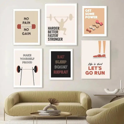 Wall with motivational fitness posters above a living room sofa.