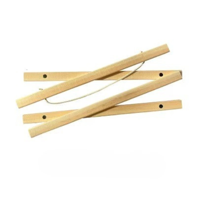 Three wooden sticks with string on a white background