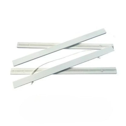 Three white plastic strips on a white background