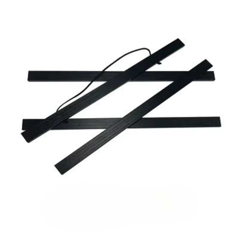 Set of black metal strips on a white background