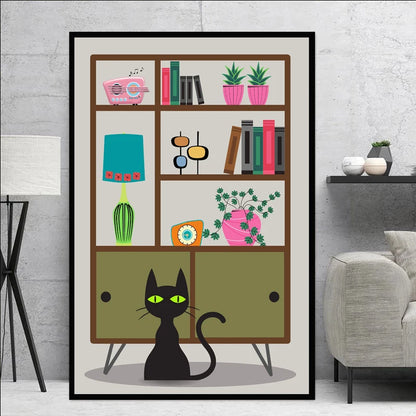 Framed artwork of a black cat looking at a bookshelf with books and plants.