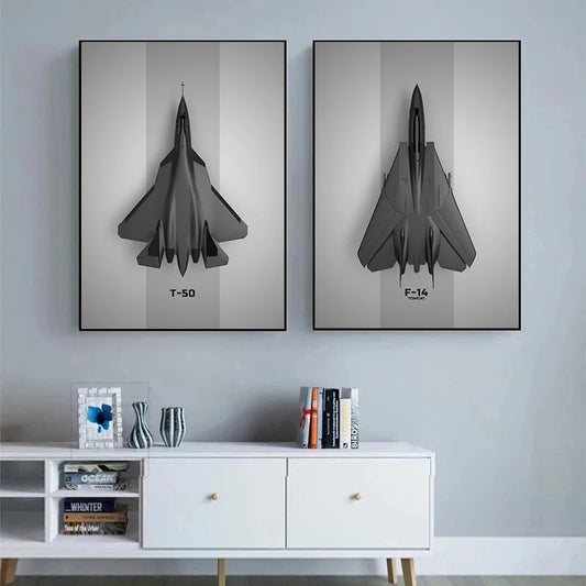 Two framed black fighter jet prints on a gray wall above a white cabinet. Canvas & Curio