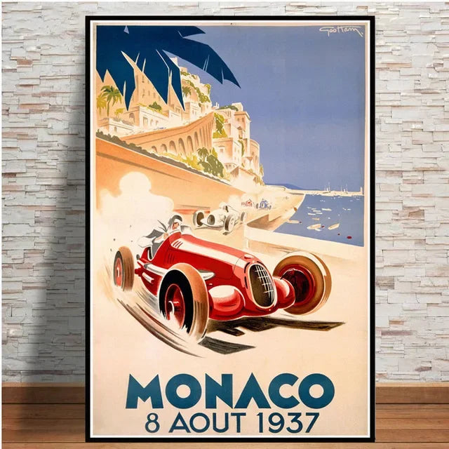 Vintage-style poster of a red race car on a beach with 'Monaco 8 Aout 1937' text, framed against a stone wall.