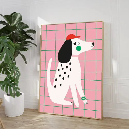 Framed artwork of a cartoon dog with a red cap on a pink grid background, placed indoors. Canvas & Curio