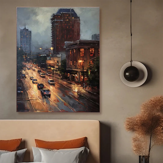 Cityscape painting above a bed with orange and white pillows, featuring a warm and cozy atmosphere. Canvas & Curio