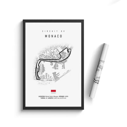 Framed poster of the Circuit de Monaco with a pen on a white background