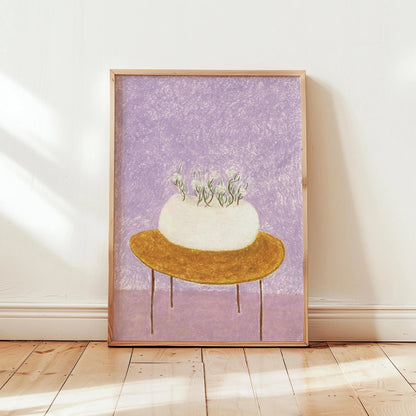 Framed artwork of a white vase with plants on a gold table against a purple background, displayed on a wooden floor.