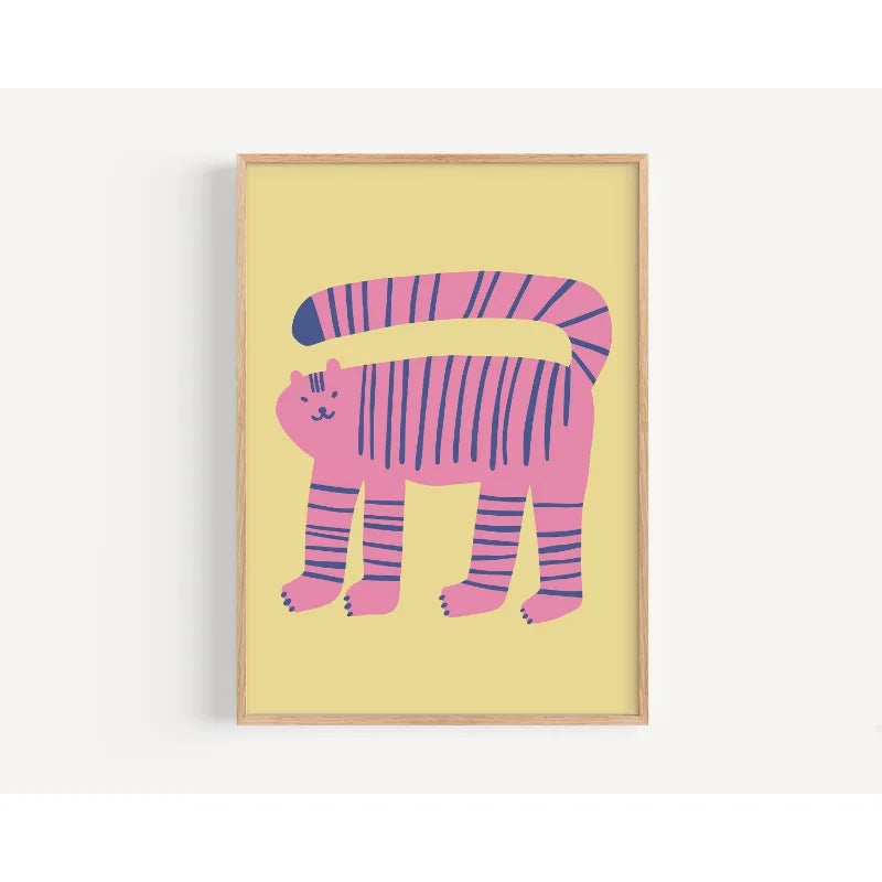 Framed artwork of a pink and blue striped cat on a yellow background
