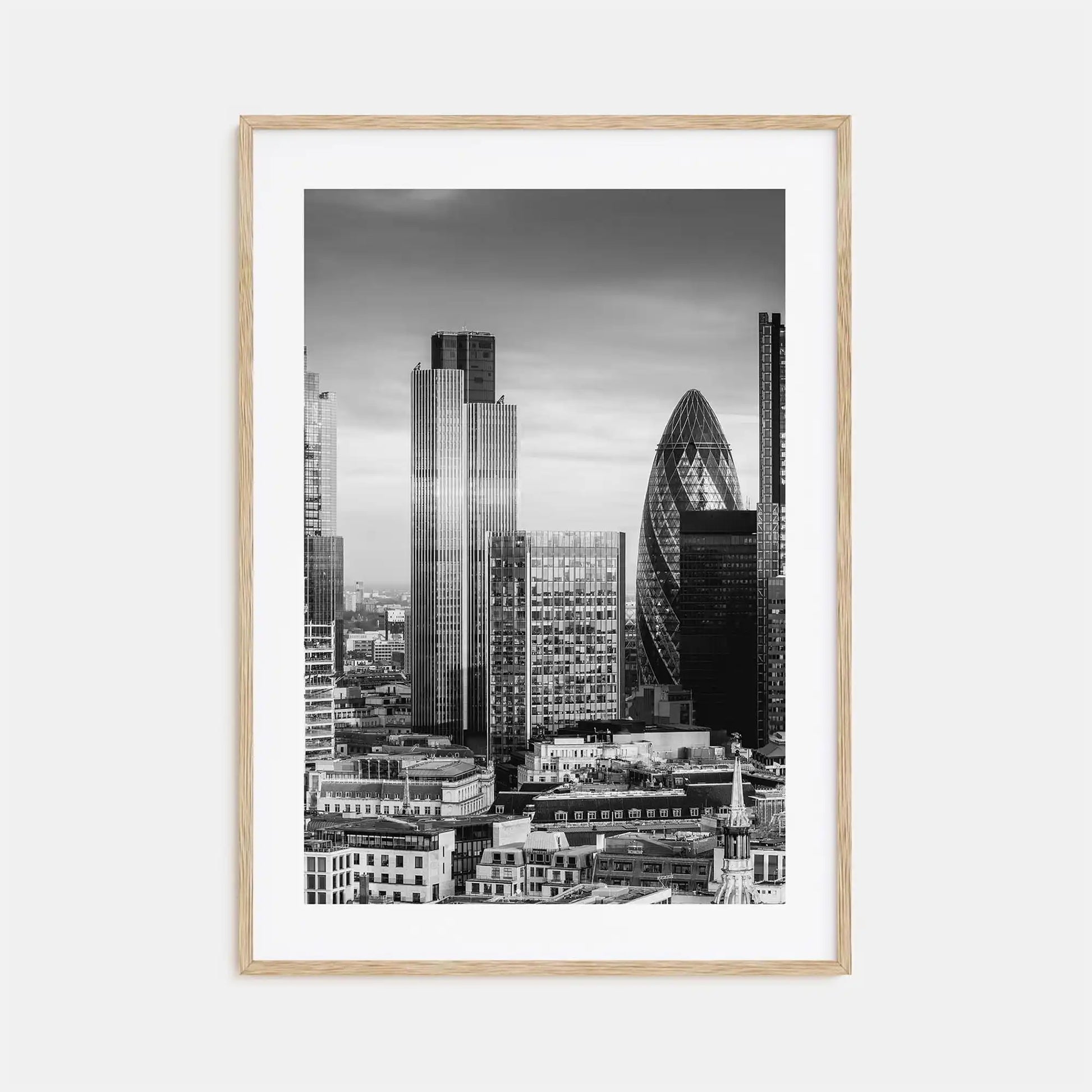 Framed black and white cityscape print with modern skyscrapers on a light gray background