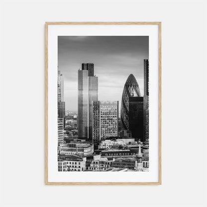 Framed black and white cityscape print with modern skyscrapers on a light gray background