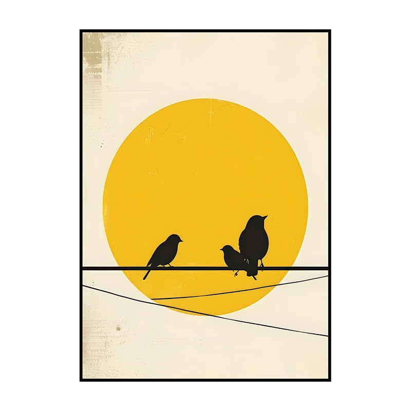 Framed artwork with three black birds on a wire against a yellow sun background