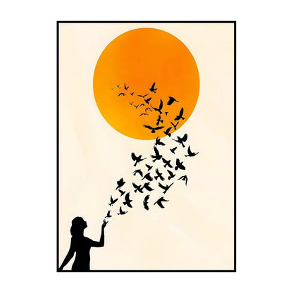Framed artwork with silhouette of a person releasing birds into an orange circle on a beige background