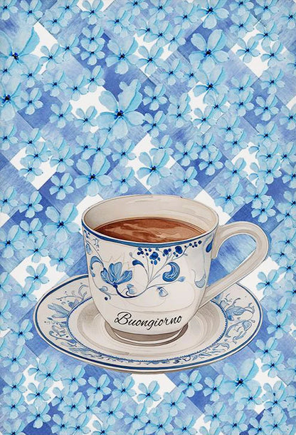 Cup of coffee with 'Buongiorno' on a saucer against a blue floral patterned background