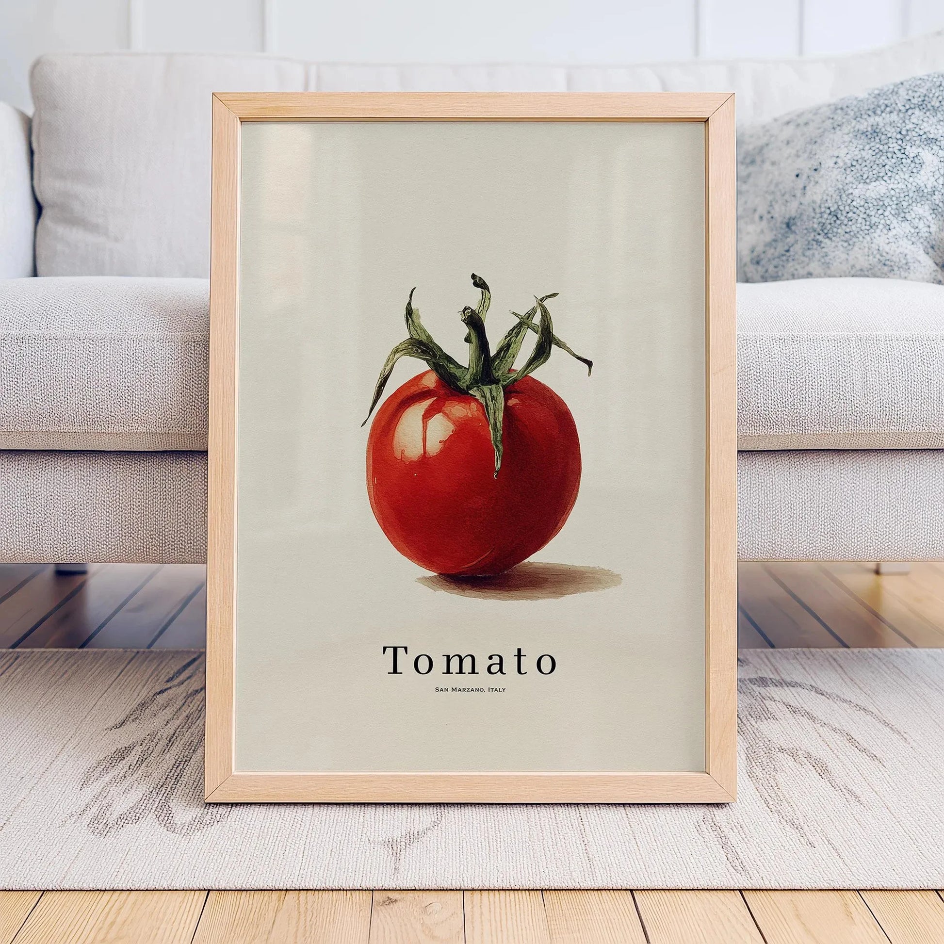 Framed poster of a tomato on a neutral background