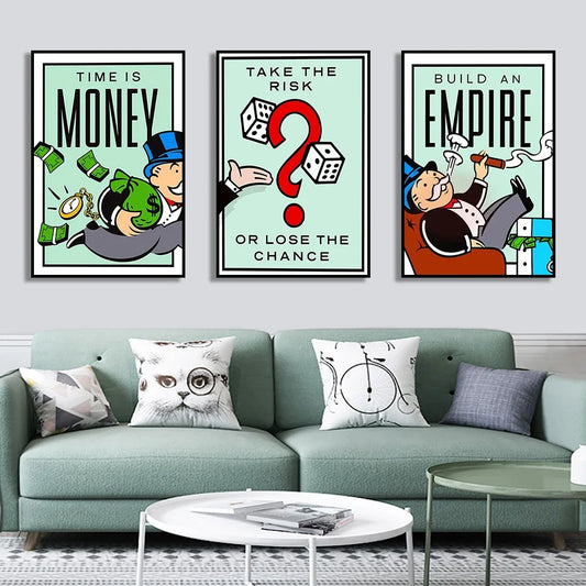 Three motivational posters on a wall above a green sofa with decorative pillows. Canvas & Curio