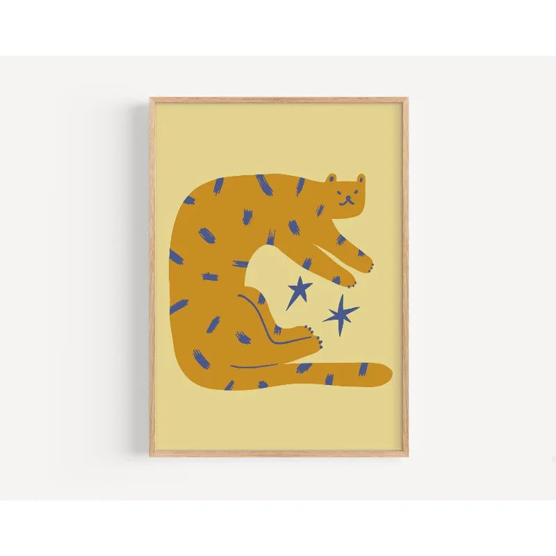 Framed artwork of a stylized bear with blue stars on a yellow background