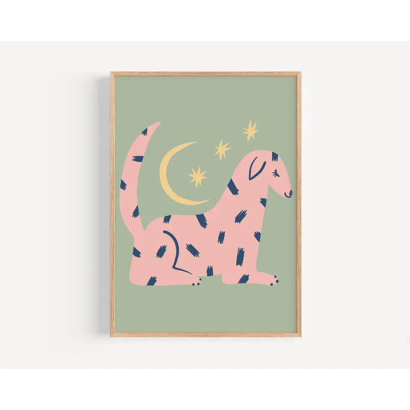 Framed artwork of a pink dinosaur with blue spots on a green background