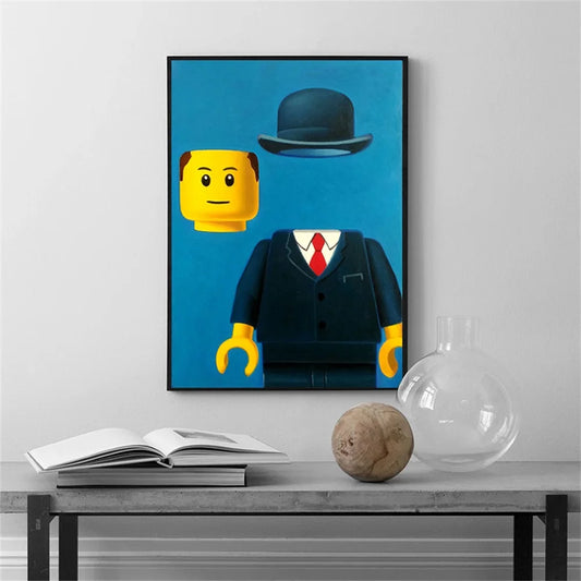 Framed artwork of a LEGO figure with a bowler hat on a wall above a table. Canvas & Curio