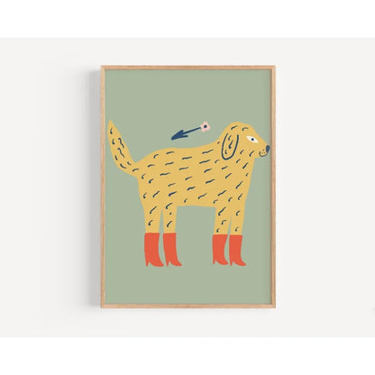 Framed illustration of a yellow dog with red shoes on a green background