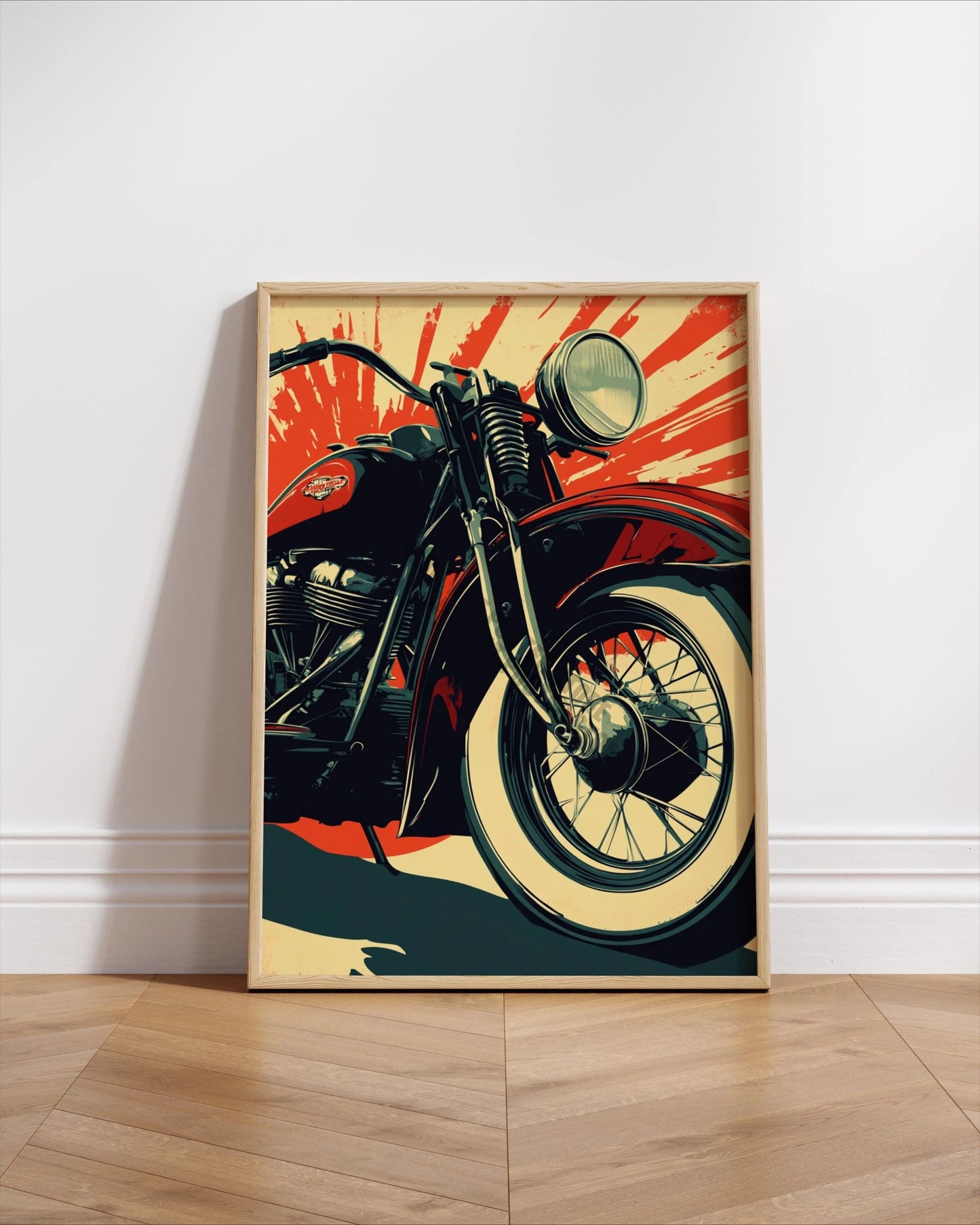 Framed poster of a motorcycle on a white wall