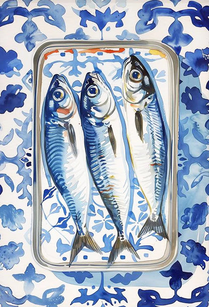 Three fish in a metal tray on a blue and white patterned background
