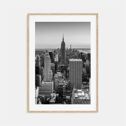 Framed black and white cityscape print of a skyline with the Empire State Building.