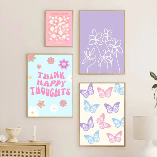 Set of four colorful framed prints on a wall, featuring floral and butterfly designs. Canvas & Curio