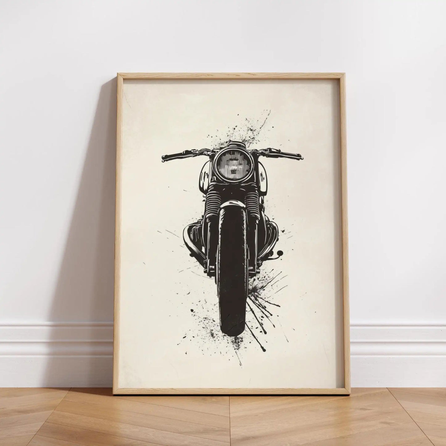 Framed artwork of a motorcycle on a white wall