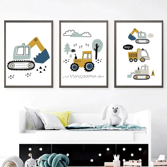 Three framed illustrations of construction vehicles on a wall above a sofa. Canvas & Curio
