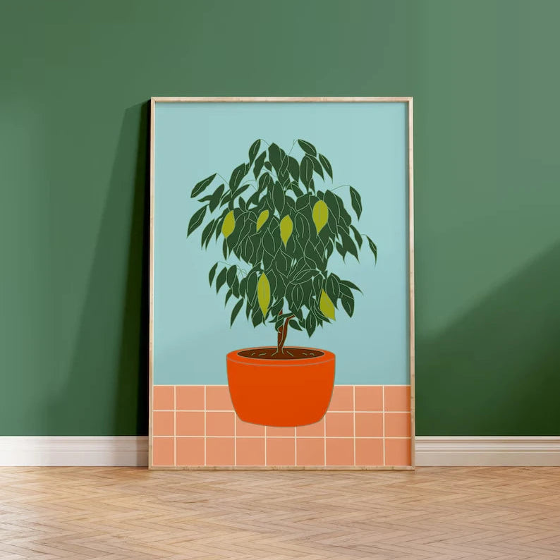 Framed artwork of a potted plant on a green wall with wooden floor.