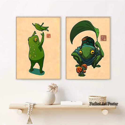 Two framed illustrations of green creatures on a beige background with a shelf below. Canvas & Curio