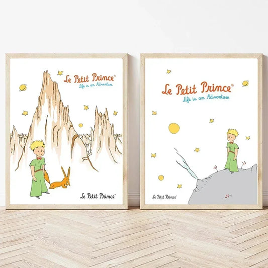 Two framed illustrations of 'Le Petit Prince' on a wooden floor. Canvas & Curio