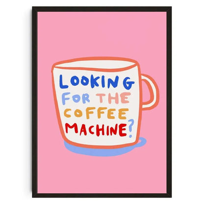 Framed artwork with a coffee mug graphic and text on a pink background