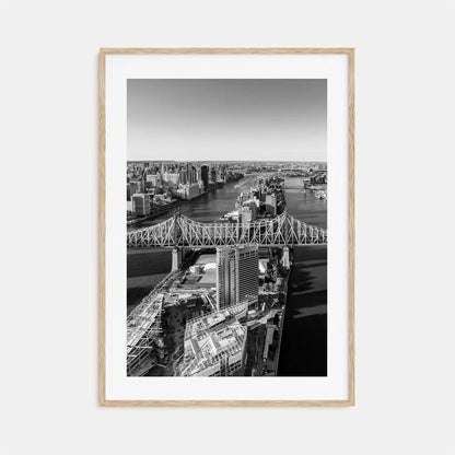 Framed black and white cityscape print with a bridge and skyline.