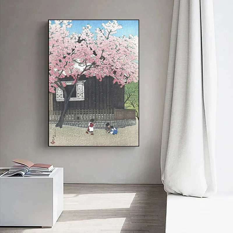 Framed artwork of cherry blossoms and children in a room with a white cabinet and curtain.
