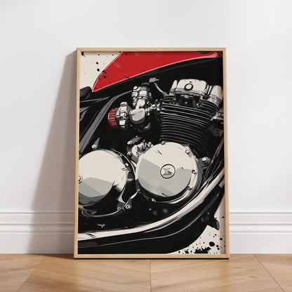 Framed poster of a motorcycle engine on a white wall.