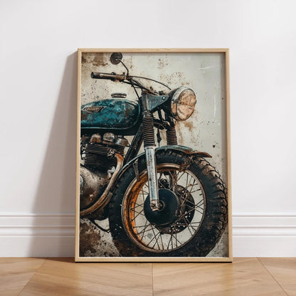 Framed artwork of a vintage motorcycle on a white wall.