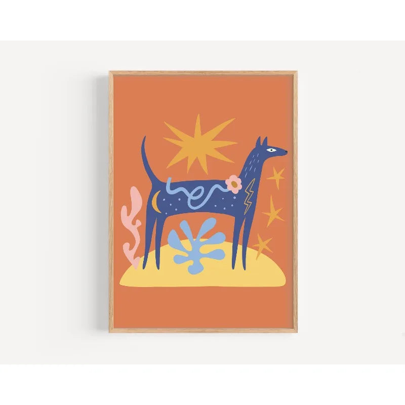 Framed abstract artwork with a blue creature, yellow sun, and orange background.