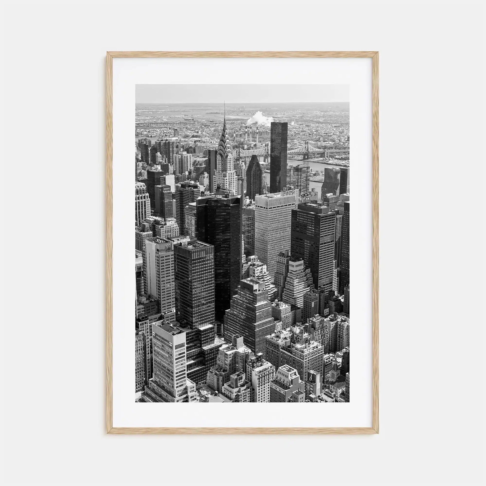 Framed black and white cityscape print on a light gray background
