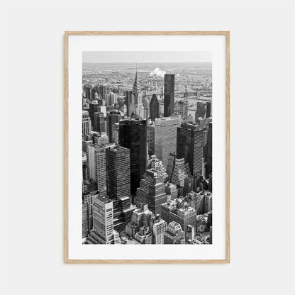 Framed black and white cityscape print on a light gray background