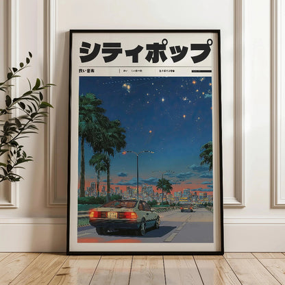 Framed poster of a cityscape with palm trees and cars under a starry sky, displayed on a wall.