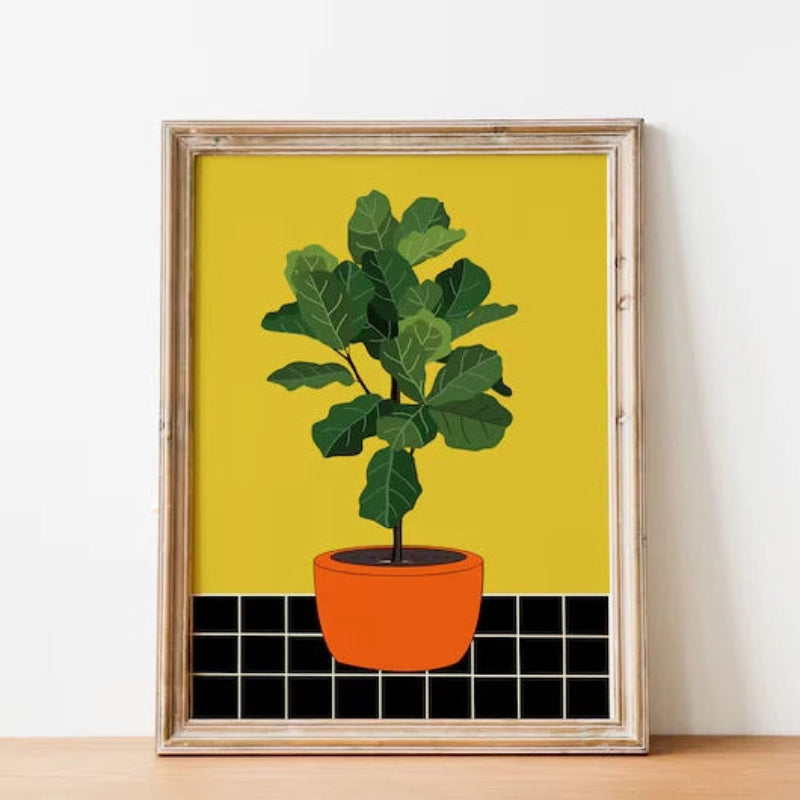 Framed artwork of a potted plant on a yellow background with black tiles