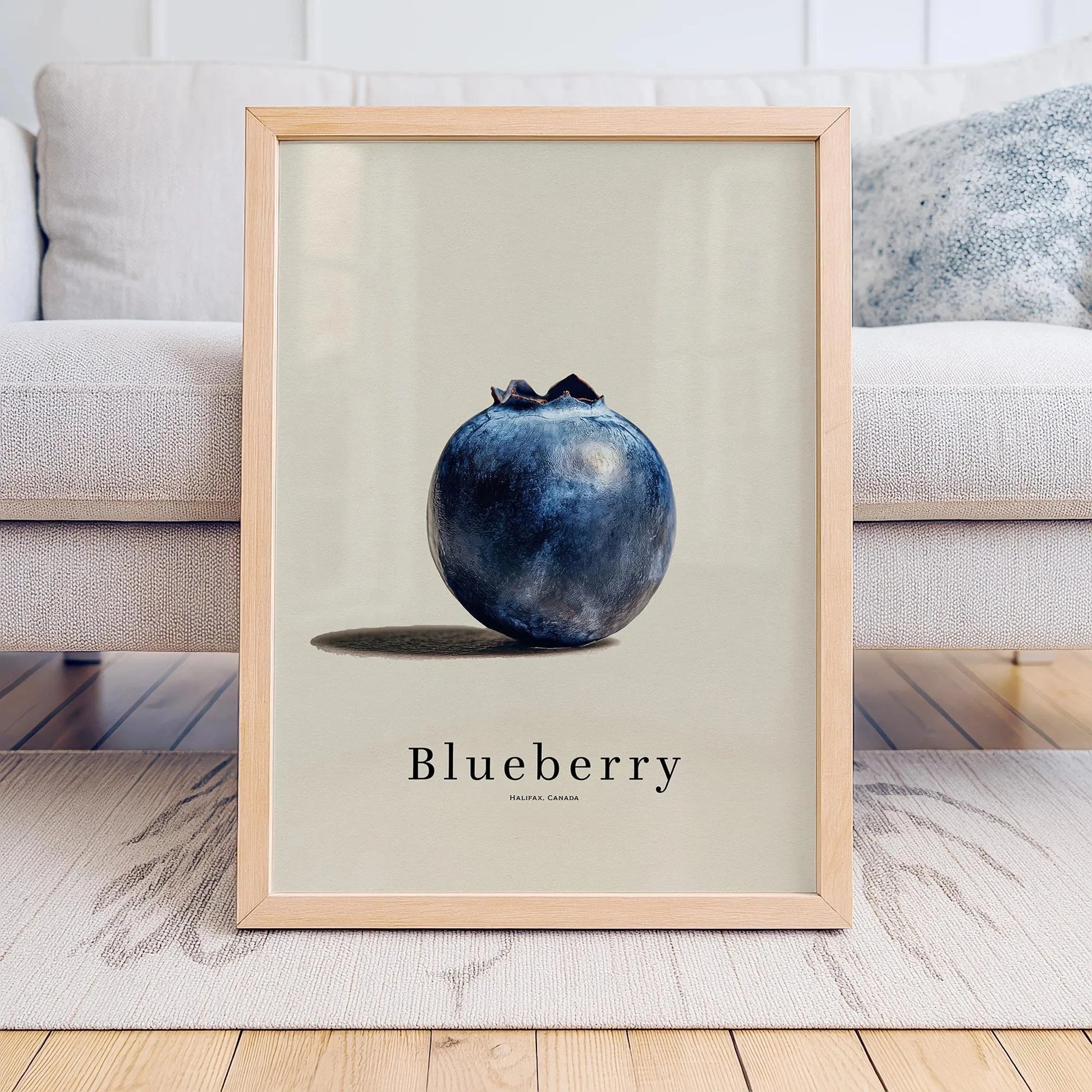 Framed print of a blueberry on a neutral background