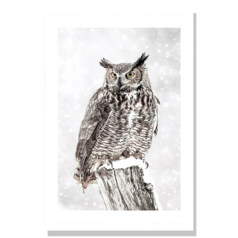 Owl perched on a branch with a snowy background