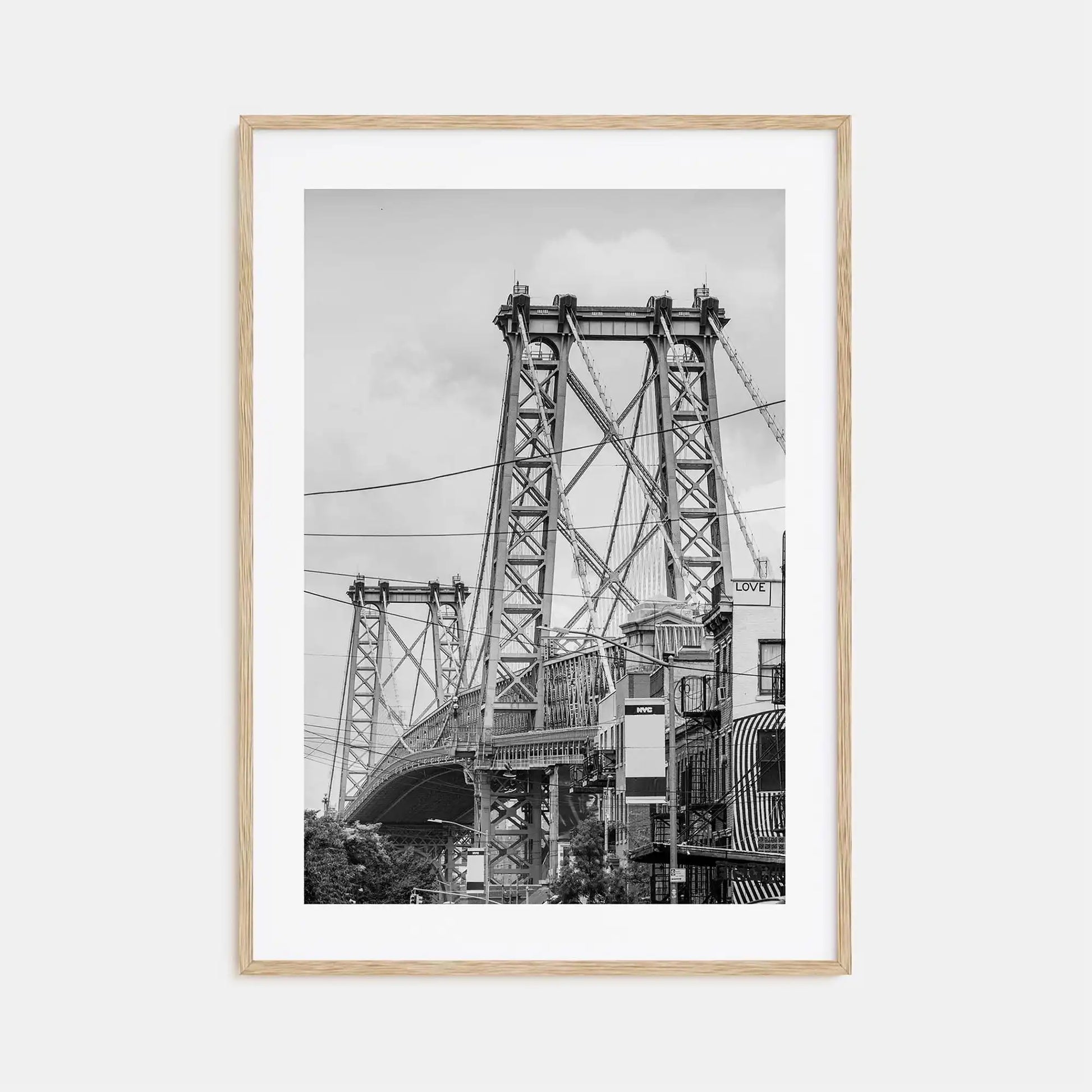 Framed black and white photograph of a bridge on a white background