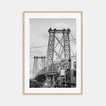 Framed black and white photograph of a bridge on a white background